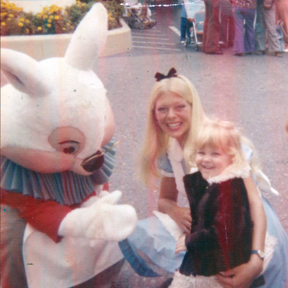 Tonja, age 3, visiting Alice & the White Rabbit on her first trip to Disneyland