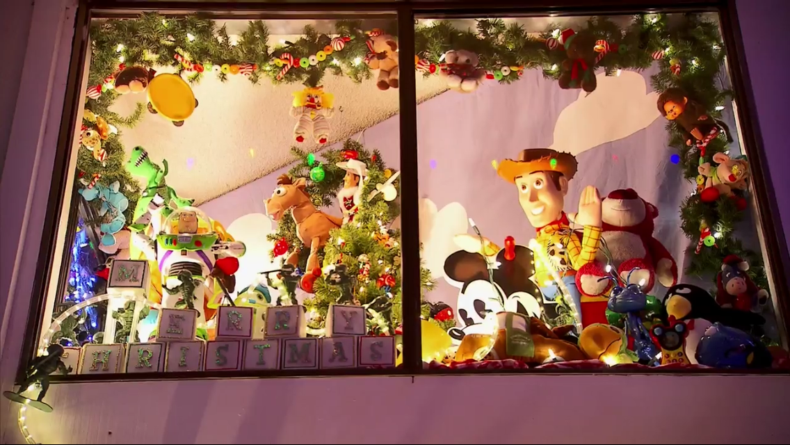 The <I>Toy Story</I> window of the Mickey Mouse Christmas House in Marinwood, CA, photo courtesy Mize family